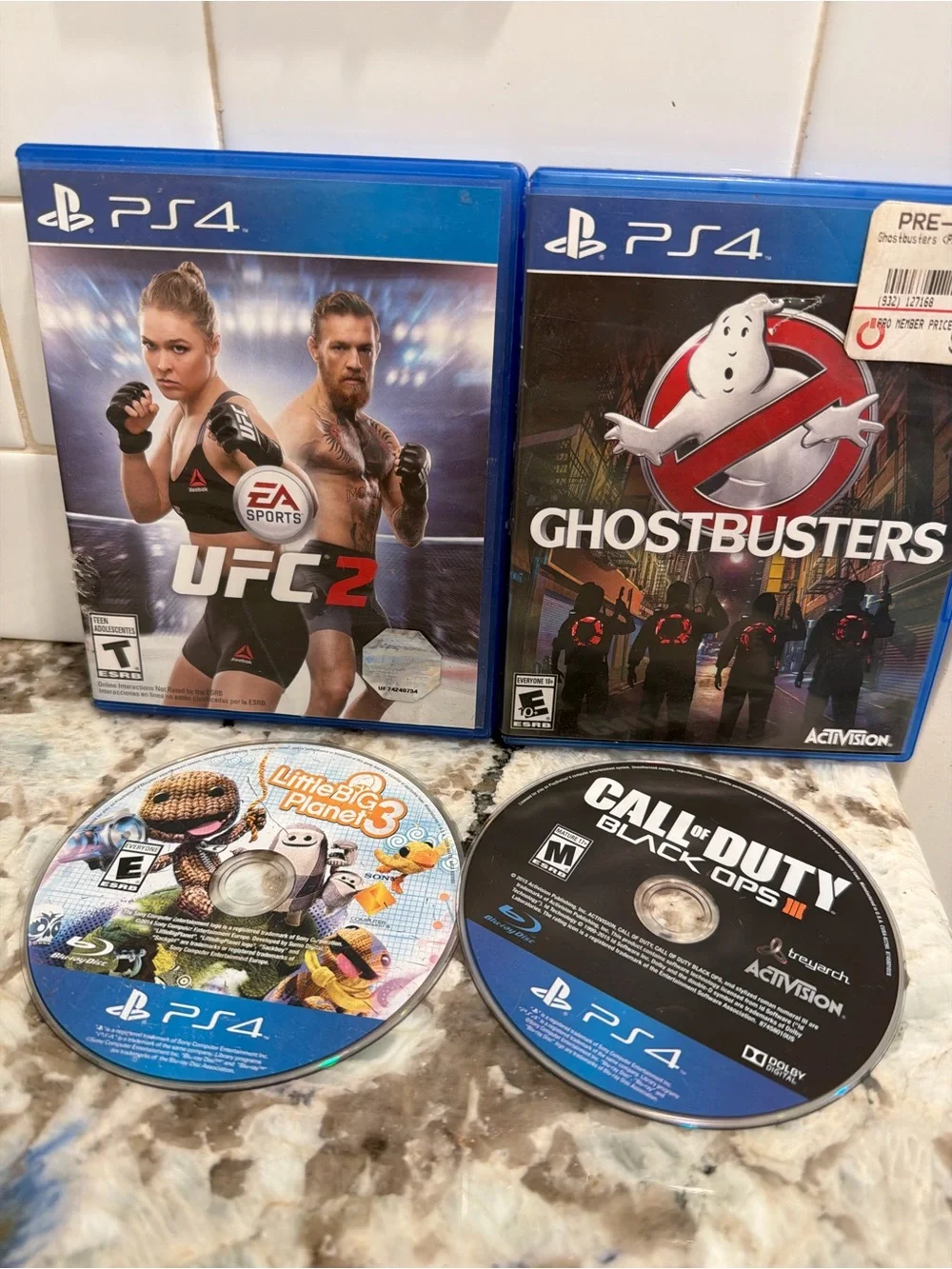 Sony PS4 Game Lot – Blue Cases with Mixed Discs